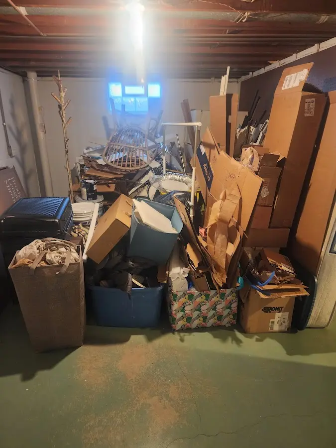 Roll-off dumpster container at job site for 2 Yard Dumpster Rental in Mankato